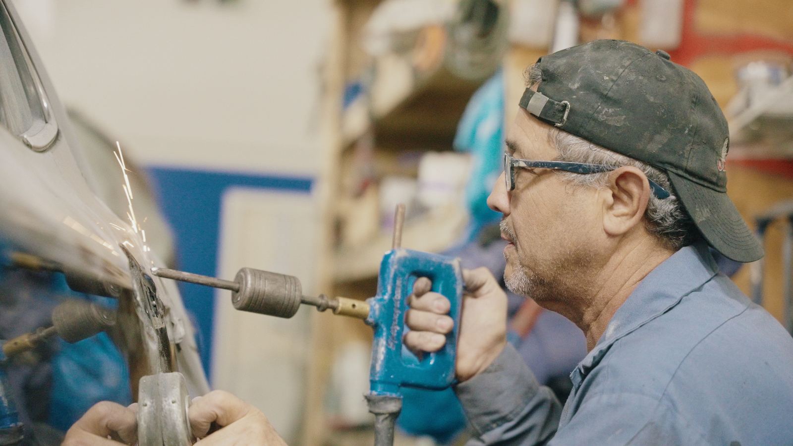 Stud-weld dent pulling on a car door